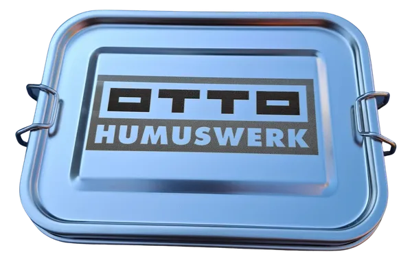 Stainless steel lunch box with latch closure and engraving of the Otto Humuswerk logo on the lid.